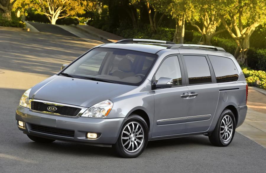  Kia Sedona 2010 года  (фото 44 из 54)
